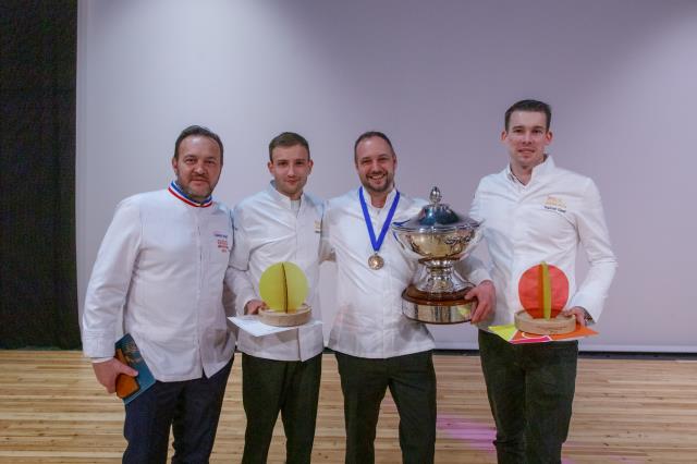 Arnaud Corpet (au centre), entouré de Raphaël Garel (à droite), Matthieu Maeder et Emmanuel Renaut (à gauche).