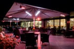 Parasol Big Ben avec chauffages de Caravita : simples, beaux et chauds